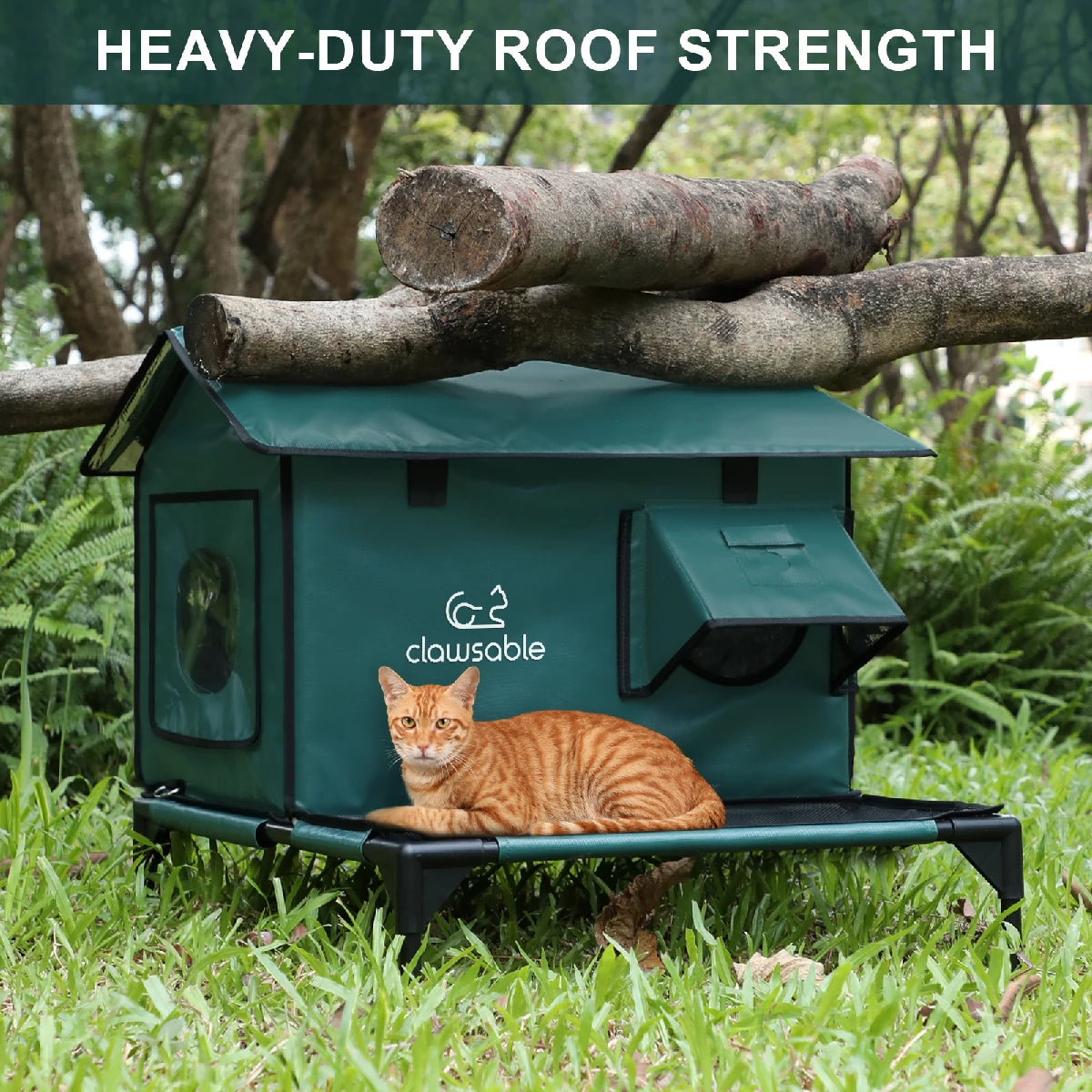 A durable outdoor heated cat shelter with a reinforced heavy-duty roof, supporting the weight of multiple large logs while a relaxed cat rests safely on the platform. Ideal for winter protection, this sturdy weatherproof cat house ensures strength and warmth for outdoor cats.