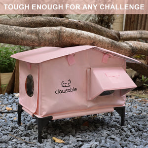 Load-bearing test of pink heated cat house showing durable structure